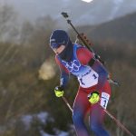 
              Marte Olsbu Roeiseland of Norway skis during the women's 15-kilometer individual race at the 2022 Winter Olympics, Monday, Feb. 7, 2022, in Zhangjiakou, China. (AP Photo/Kirsty Wigglesworth)
            