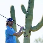 
              Green Bay Packers NFL football quarterback Aaron Rodgers hits his tee shot in front of a saguaro cactus at the first hole during the Pro-Am at the Phoenix Open golf tournament Wednesday, Feb. 9, 2022, in Scottsdale, Ariz. (AP Photo/Ross D. Franklin)
            