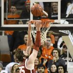 
              Oklahoma forward Tanner Groves (35) dunks the basketball in the first half of an NCAA college basketball game Saturday, Feb. 5, 2022, against Oklahoma State, in Stillwater, Okla. Oklahoma State defeated rival Oklahoma 64-55. (AP Photo/Brody Schmidt)
            