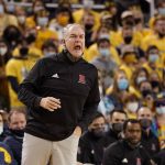 
              Rutgers head coach Steve Pikiell yells from the sideline during the first half of an NCAA college basketball game against Michigan, Wednesday, Feb. 23, 2022, in Ann Arbor, Mich. (AP Photo/Carlos Osorio)
            