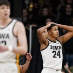 
              Iowa forward Kris Murray (24) reacts after being called for a foul during the second half of an NCAA college basketball game against Michigan, Thursday, Feb. 17, 2022, in Iowa City, Iowa. (AP Photo/Charlie Neibergall)
            