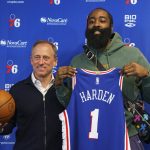 
              Philadelphia 76ers' James Harden, right, and owner Joshua Harris, left, poses for photos following a press conference at the NBA basketball team's facility, Tuesday, Feb. 15, 2022, in Camden, N.J. (AP Photo/Chris Szagola)
            