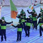 
              Elsa Desmond and Brendan Newby, of Ireland, carry their country's flag during the opening ceremony of the 2022 Winter Olympics, Friday, Feb. 4, 2022, in Beijing. (AP Photo/Bernat Armangue)
            