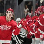 
              Detroit Red Wings left wing Tyler Bertuzzi (59) celebrates his goal against the Los Angeles Kings in the third period of an NHL hockey game Wednesday, Feb. 2, 2022, in Detroit. (AP Photo/Paul Sancya)
            