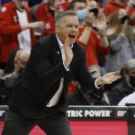 
              Ohio State head coach Chris Holtmann cheers his team on against Maryland during the first half of an NCAA college basketball game, Sunday, Feb. 6, 2022, in Columbus, Ohio. (AP Photo/Jay LaPrete)
            