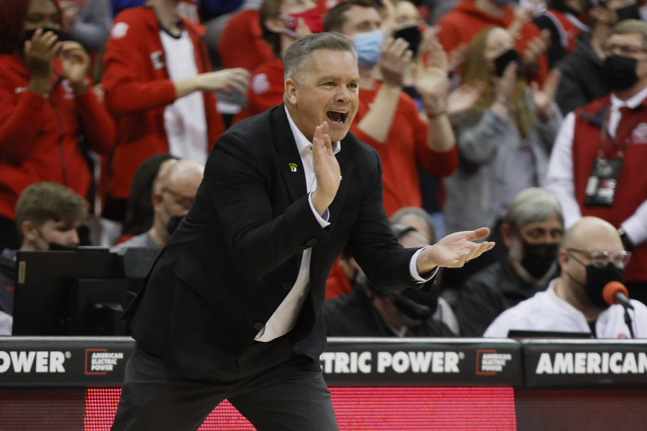 Ohio State head coach Chris Holtmann cheers his team on against Maryland during the first half of a...