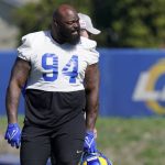 
              Los Angeles Rams defensive end A'Shawn Robinson stands on the field during practice for an NFL Super Bowl football game Wednesday, Feb. 9, 2022, in Thousand Oaks, Calif. The Rams are scheduled to play the Cincinnati Bengals in the Super Bowl on Sunday. (AP Photo/Mark J. Terrill)
            