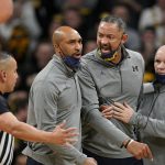 
              Michigan head coach Juwan Howard, center, reacts after being called for a technical foul during the first half of an NCAA college basketball game against Iowa, Thursday, Feb. 17, 2022, in Iowa City, Iowa. (AP Photo/Charlie Neibergall)
            