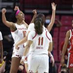 
              Maryland's Angel Reese (10) celebrates after scoring against Ohio State during the second half of an NCAA college basketball game Thursday, Feb. 17, 2022, in College Park, Md. Maryland won 77-72. (AP Photo/Gail Burton)
            