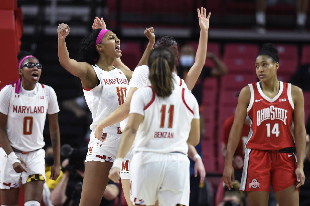 Maryland's Angel Reese (10) celebrates after scoring against Ohio State during the second half of a...