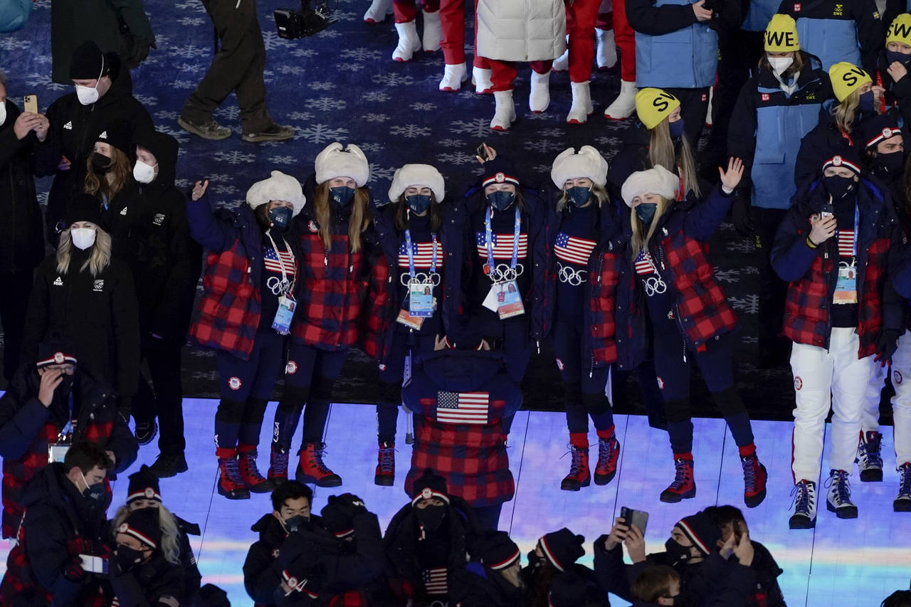 Members of team United States pose during the closing ceremony of the 2022 Winter Olympics, Sunday,...