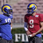 
              Los Angeles Rams wide receiver Cooper Kupp, left, talks with quarterback Matthew Stafford during practice for an NFL Super Bowl football game Thursday, Feb. 10, 2022, in Pasadena, Calif. The Rams are scheduled to play the Cincinnati Bengals in the Super Bowl on Sunday. (AP Photo/Mark J. Terrill)
            