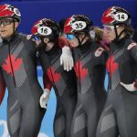 
              Team Canada react after the mixed team relay final during the short track speedskating competition at the 2022 Winter Olympics, Saturday, Feb. 5, 2022, in Beijing. (AP Photo/Natacha Pisarenko)
            