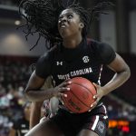 
              South Carolina forward Laeticia Amihere (15) grabs a rebound against Texas A&M during the first half of an NCAA college basketball game Thursday, Feb. 24, 2022, in College Station, Texas. (AP Photo/Sam Craft)
            