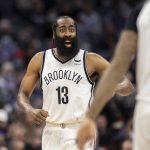 
              Brooklyn Nets guard James Harden (13) yells to forward James Johnson (16) during the second half of the team's NBA basketball game against the Sacramento Kings in Sacramento, Calif., Wednesday, Feb. 2, 2022. (AP Photo/José Luis Villegas)
            