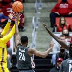 Arizona State guard Jay Heath (5) shoots over Washington State guard Noah Williams (24) during the first half of an NCAA college basketball game Saturday, Feb. 12, 2022, in Pullman, Wash. (AP Photo/August Frank)