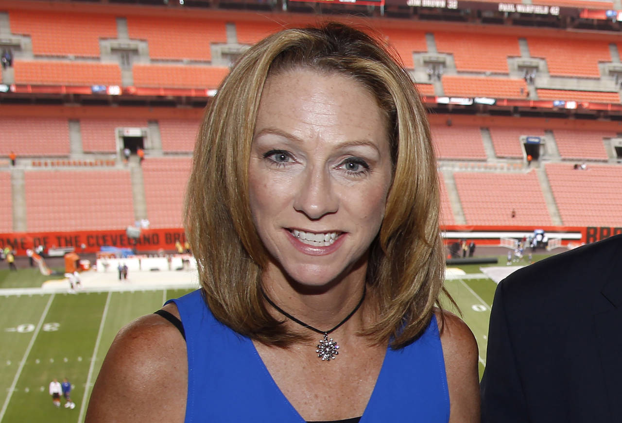 FILE - ESPN broadcaster Beth Mowins poses in the booth before an NFL football game between the New ...