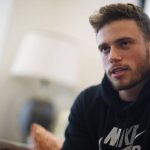 
              FILE- Gus Kenworthy, a freestyle skier who won a silver medal in Sochi, speaks in his home in Denver on Oct. 21, 2015. “We’re in China, so we play by China’s rules. And China makes their rules as they go, and they certainly have the power to kind of do whatever they want: Hold an athlete, stop an athlete from leaving, stop an athlete from competing,” Kenworthy said on Sunday, Feb. 20, at the 2022 Beijing Olympics. (AP Photo/David Zalubowski, File)
            