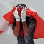 
              Steven Dubois of Canada, reacts after his second place finish in the men's 1500-meters final during the short track speedskating competition at the 2022 Winter Olympics, Wednesday, Feb. 9, 2022, in Beijing. (AP Photo/David J. Phillip)
            
