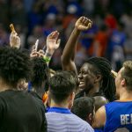 
              Florida forward Anthony Duruji (4), center, celebrates with team after Florida's 63-62 win over Auburn during an NCAA college basketball game Saturday, Feb. 19, 2022, in Gainesville, Fla. (AP Photo/Alan Youngblood)
            