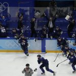 
              Finland celebrates defeating the Russian Olympic Committee in the men's gold medal hockey game at the 2022 Winter Olympics, Sunday, Feb. 20, 2022, in Beijing. (AP Photo/Jae C. Hong)
            