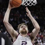 
              Gonzaga forward Drew Timme goes up for a dunk during the first half of the team's NCAA college basketball game against Santa Clara, Saturday, Feb. 19, 2022, in Spokane, Wash. (AP Photo/Young Kwak)
            