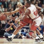 
              FILE - Philadelphia's Charles Barkley works to keep Chicago's Horace Grant away from the ball during the first quarter of Wednesday night's Playoff game in Chicago, May 16, 1990. (AP Photo/John Swart, File)
            