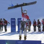 
              Gold medalist Czech Republic's Ester Ledecka celebrates during the venue ceremony for the women's parallel giant slalom at the 2022 Winter Olympics, Tuesday, Feb. 8, 2022, in Zhangjiakou, China. (AP Photo/Gregory Bull)
            