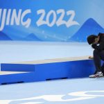 
              Gao Tingyu of China reacts after winning the gold medal and setting an Olympic record in the men's speedskating 500-meter race at the 2022 Winter Olympics, Saturday, Feb. 12, 2022, in Beijing. (AP Photo/Ashley Landis)
            