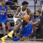 
              Missouri's Kobe Brown, left, and Florida's Brandon McKissic, right, collide during the first half of an NCAA college basketball game Wednesday, Feb. 2, 2022, in Columbia, Mo. (AP Photo/L.G. Patterson)
            