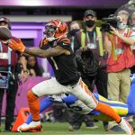 
              Cincinnati Bengals wide receiver Ja'Marr Chase (1) makes a catch against the Los Angeles Rams during the first half of the NFL Super Bowl 56 football game Sunday, Feb. 13, 2022, in Inglewood, Calif. (AP Photo/Chris O'Meara)
            
