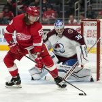 
              Detroit Red Wings left wing Tyler Bertuzzi (59) controls the puck while Colorado Avalanche goaltender Pavel Francouz (39) defends in the second period of an NHL hockey game Wednesday, Feb. 23, 2022, in Detroit. (AP Photo/Paul Sancya)
            