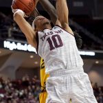 
              Missouri forward Kobe Brown (24) blocks a shot attempt by Texas A&M forward Ethan Henderson (10) during the second half of an NCAA college basketball game, Saturday, Feb. 5, 2022, in College Station, Texas. (AP Photo/Sam Craft)
            