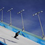 
              Mathilde Gremaud, of Switzerland, trains ahead of the women's freestyle skiing Big Air qualification round of the 2022 Winter Olympics, Monday, Feb. 7, 2022, in Beijing. (AP Photo/Matt Slocum)
            