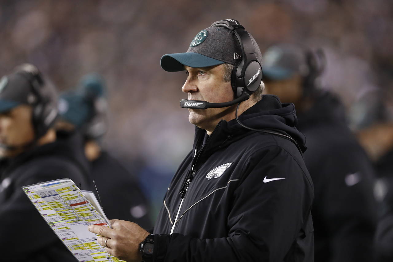 FILE - Philadelphia Eagles coach Doug Pederson watches from the sideline during the first half of t...