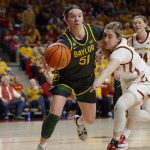 
              Baylor forward Caitlin Bickle (51) saves the ball from going out of bounds as Iowa State forward Morgan Kane (31) defends during the first half of an NCAA college basketball game Monday, Feb. 28, 2022, in Ames, Iowa. (AP Photo/Matthew Putney)
            