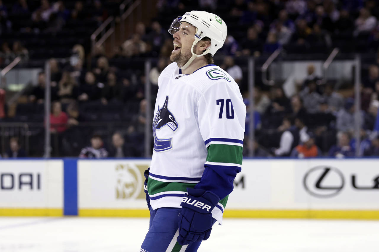 Vancouver Canucks left wing Tanner Pearson reacts after scoring a goal in the first period of an NH...