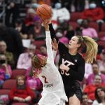 
              Virginia Tech center Elizabeth Kitley (33) blocks the shot of Louisville guard Ahlana Smith (2) during the first half of an NCAA college basketball game in Louisville, Ky., Sunday, Feb. 20, 2022. (AP Photo/Timothy D. Easley)
            