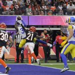 
              Los Angeles Rams wide receiver Odell Beckham Jr. (3) makes a catch against Cincinnati Bengals cornerback Mike Hilton (21) for a touchdown during the first half of the NFL Super Bowl 56 football game Sunday, Feb. 13, 2022, in Inglewood, Calif. (AP Photo/Mark J. Terrill)
            