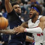 
              Detroit Pistons forward Saddiq Bey (41) goes to the basket as Minnesota Timberwolves center Karl-Anthony Towns, left, defends him in the fourth quarter of an NBA basketball game Sunday, Feb. 6, 2022, in Minneapolis. (AP Photo/Bruce Kluckhohn)
            