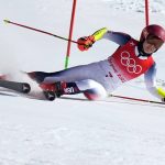 
              Mikaela Shiffrin of United States loses control and skis off course during the first run of the women's giant slalom at the 2022 Winter Olympics, Monday, Feb. 7, 2022, in the Yanqing district of Beijing. (AP Photo/Robert F. Bukaty)
            
