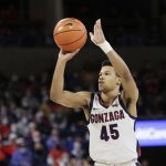 
              Gonzaga guard Rasir Bolton shoots during the second half of an NCAA college basketball game against Pacific, Thursday, Feb. 10, 2022, in Spokane, Wash. (AP Photo/Young Kwak)
            