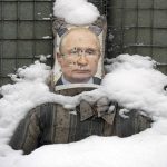 
              FILE- A bullet riddled effigy of Russian President Vladimir Putin, is coated by fresh snow at a frontline position in the Luhansk region, eastern Ukraine, Tuesday, Feb. 1, 2022. More than 100,000 Russian troops are currently massed along the Ukrainian border preparing for a possible invasion. Despite weeks of diplomacy, Putin still seems to hold all the cards, pushing Europe to the brink of war and prompting British Prime Minister Boris Johnson to call this the continent's "most dangerous moment" in decades. (AP Photo/Vadim Ghirda, File)
            