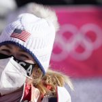 
              Mikaela Shiffrin, of the United States in the finish area after women's downhill training at the 2022 Winter Olympics, Monday, Feb. 14, 2022, in the Yanqing district of Beijing. (AP Photo/Luca Bruno)
            