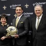 
              New Orleans Saints new head coach Dennis Allen, center, poses for a picture with team owner Gayle Benson, left and general manager Mickey Loomis following a news conference at the NFL football team's training facility, Tuesday, Feb. 8, 2022, in Metairie, La. (AP Photo/Derick Hingle)
            