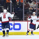 
              Washington Capitals' Joe Snively, right, celebrates with Alex Ovechkin (8) after scoring a goal during the second period of an NHL hockey game against the Philadelphia Flyers, Thursday, Feb. 17, 2022, in Philadelphia. (AP Photo/Derik Hamilton)
            