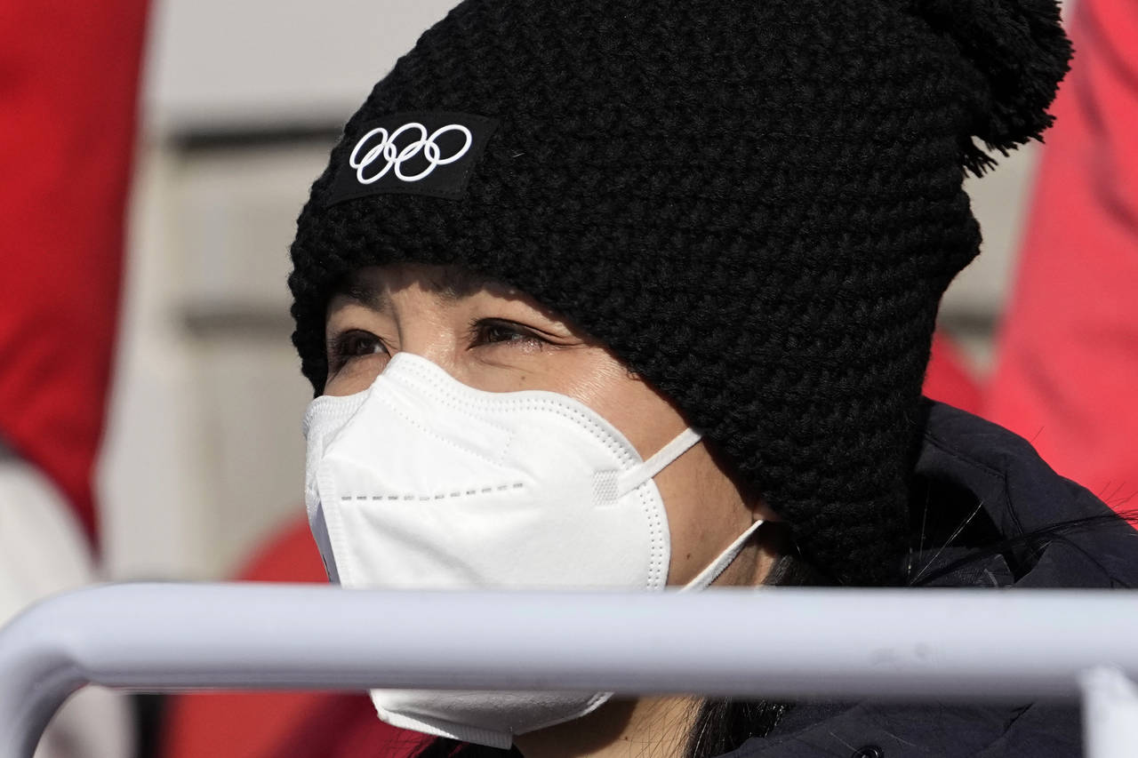 China's Peng Shuai watches the women's freestyle skiing big air finals at the 2022 Winter Olympics,...