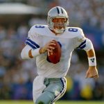 
              FILE - Dallas Cowboys quarterback Troy Aikman carries the ball during the first quarter of NFL football's Super Bowl XXVII against the Buffalo Bills in Pasadena, Calif.,  Jan. 31, 1993. (AP Photo/Doug Mills, File)
            