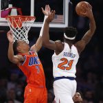 
              New York Knicks' Mitchell Robinson (23) shoots over Oklahoma City Thunder's Darius Bazley (7) during the first half of an NBA basketball game Monday, Feb. 14, 2022, in New York. (AP Photo/John Munson)
            