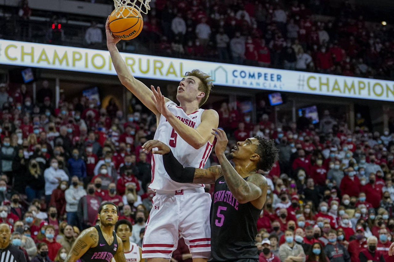 Wisconsin's Tyler Wahl (5) shoots the winning basket against Penn State's Greg Lee (5) during the s...